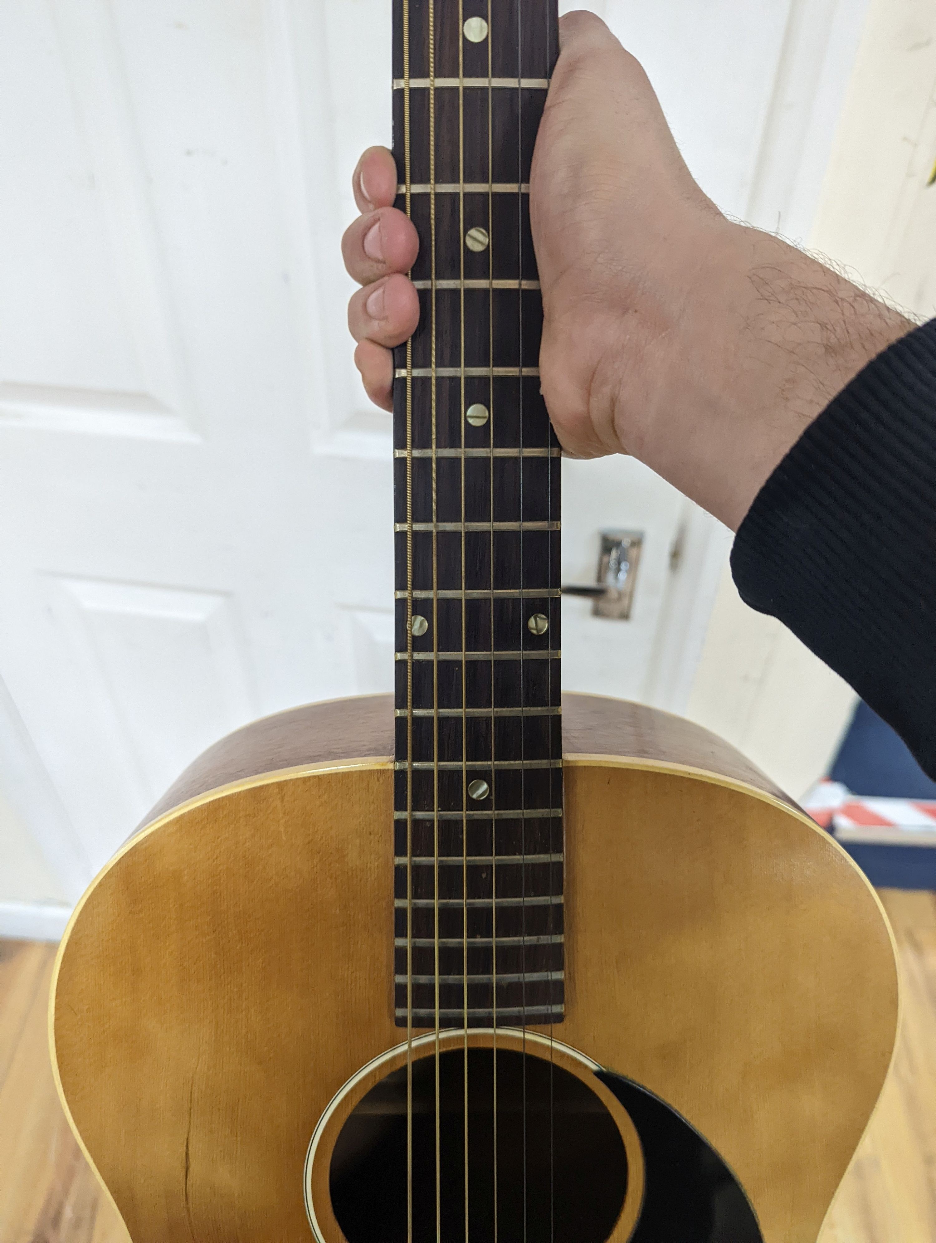 A Gibson acoustic guitar in hard case, serial no. 430 862